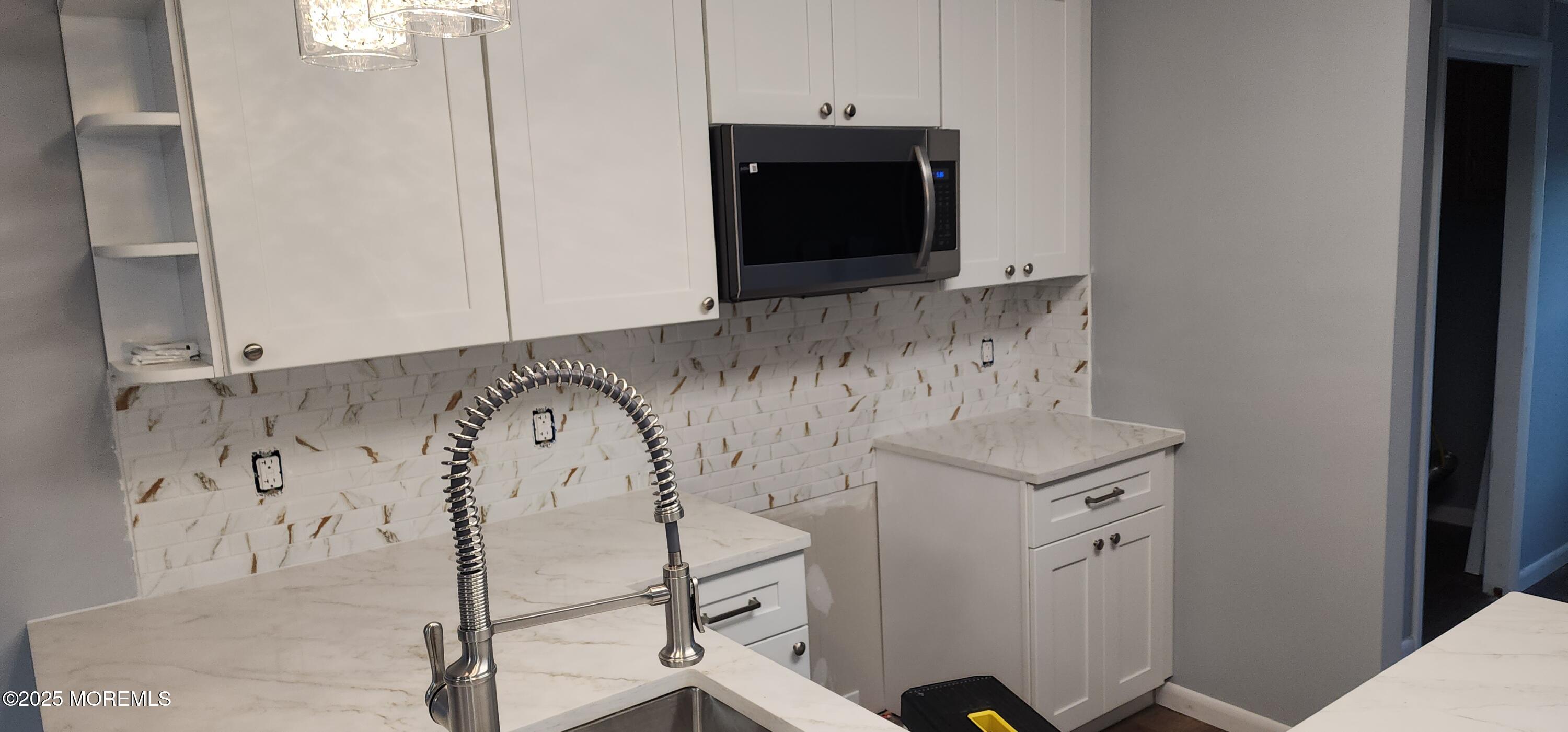 18 Ruffian Way Howell, NJ 07731 - Photo 9 of 9 a view of utility room