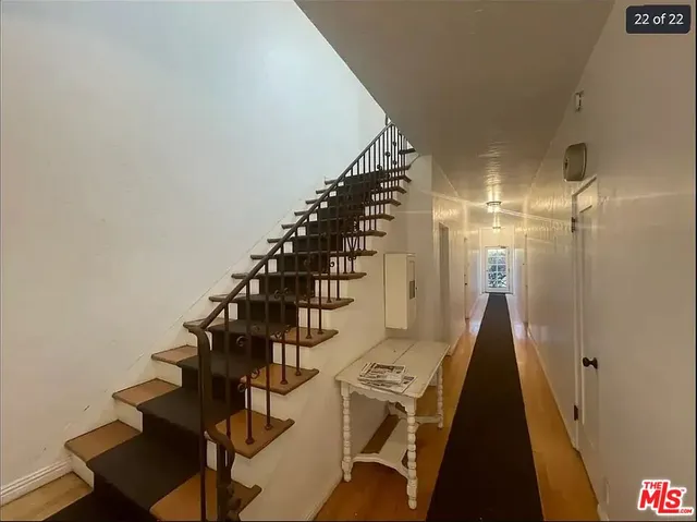 a view of entryway with wooden floor