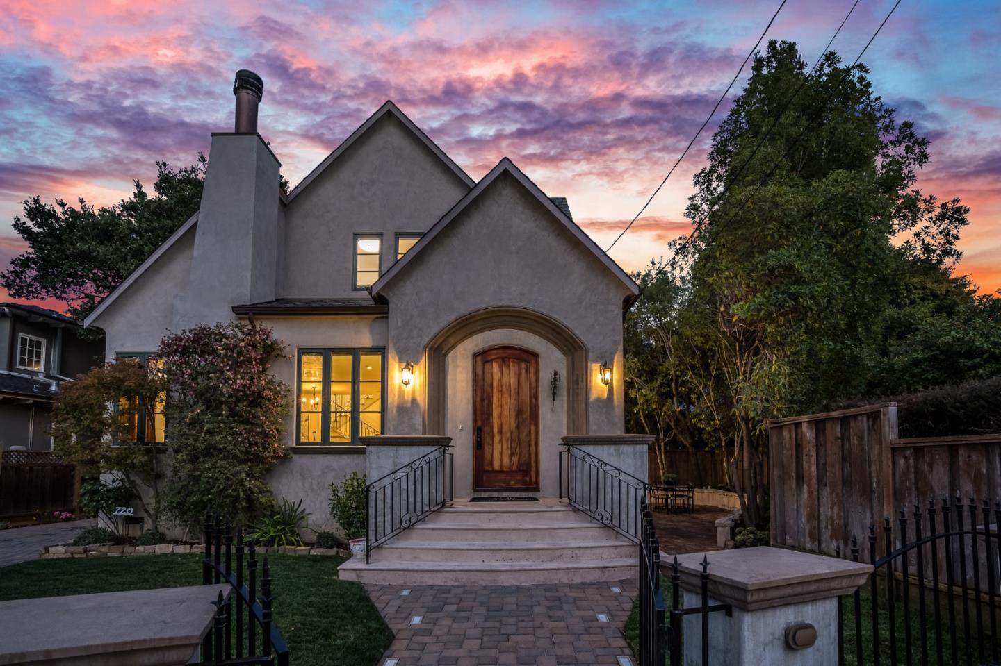 720 Edgewood Road San Mateo, CA 94402 - Photo 1 of 56 a front view of a house with a yard