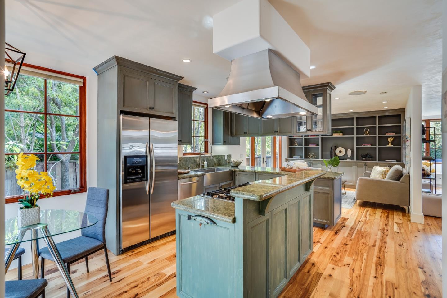 720 Edgewood Road San Mateo, CA 94402 - Photo 21 of 56 a kitchen with stainless steel appliances granite countertop a stove and cabinets