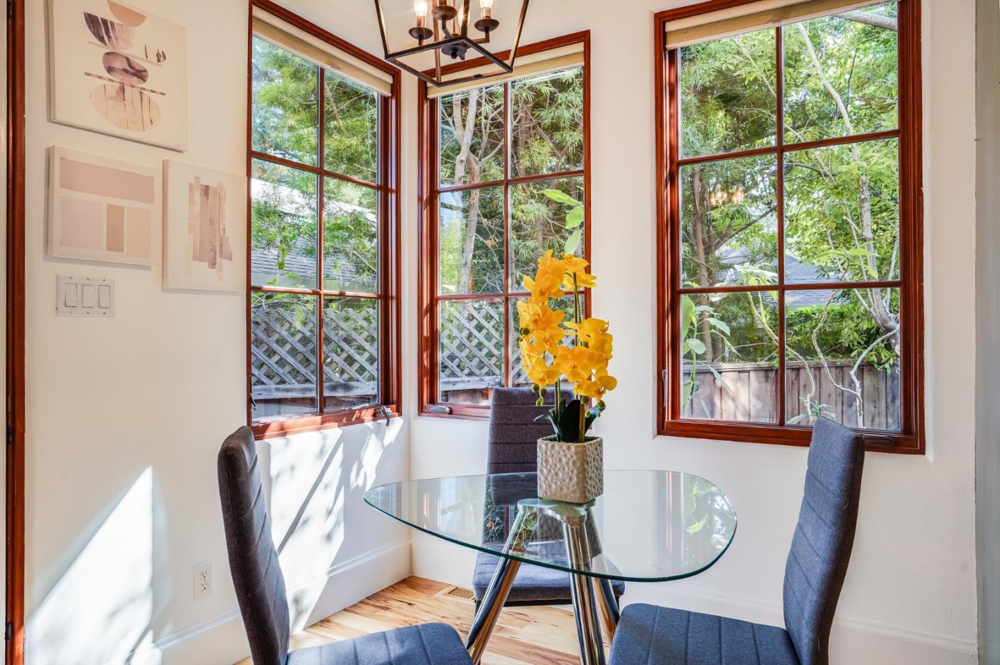 720 Edgewood Road San Mateo, CA 94402 - Photo 23 of 56 a view of a dining room with furniture window and wooden floor