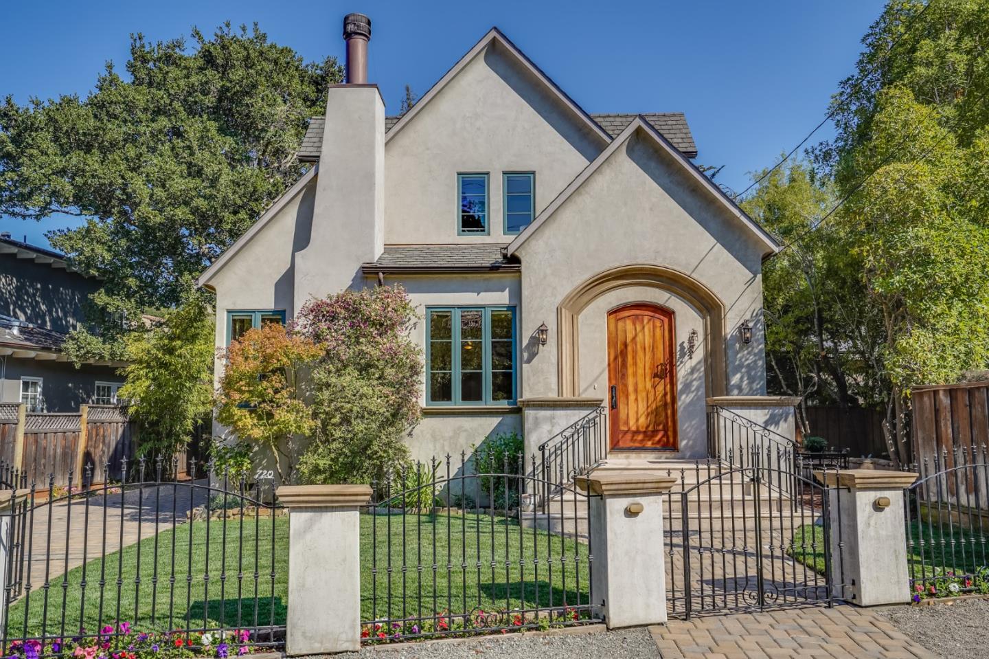 720 Edgewood Road San Mateo, CA 94402 - Photo 3 of 56 a front view of a house with garden