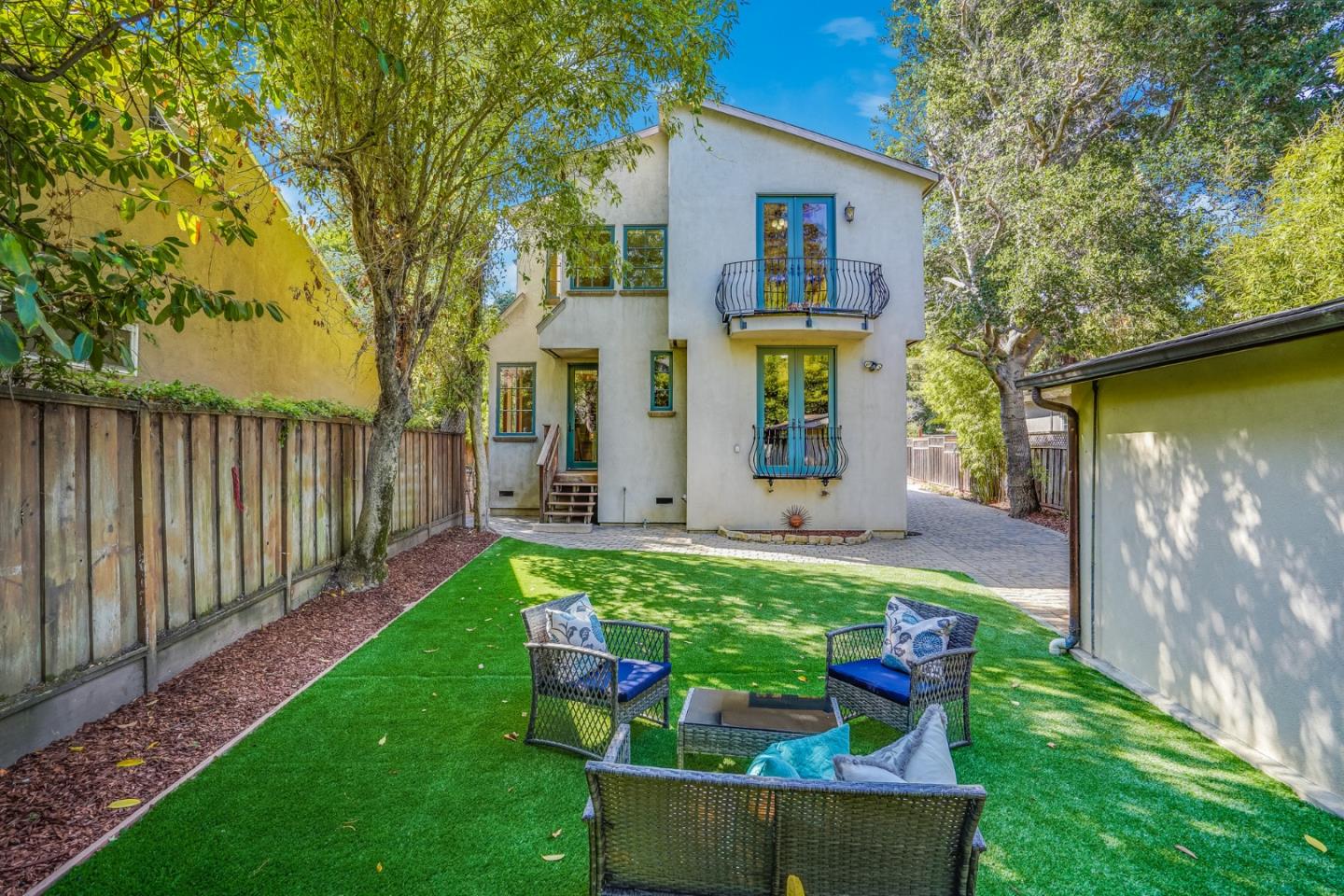 720 Edgewood Road San Mateo, CA 94402 - Photo 45 of 56 a view of house with backyard outdoor seating and hardwood