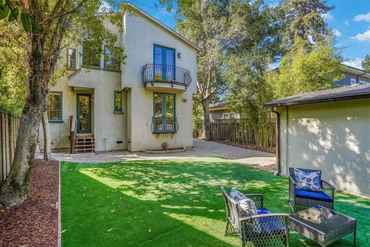 720 Edgewood Road San Mateo, CA 94402 - Photo 46 of 56 a view of a house with backyard and sitting area
