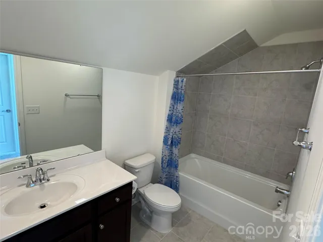 view of an empty room with windows