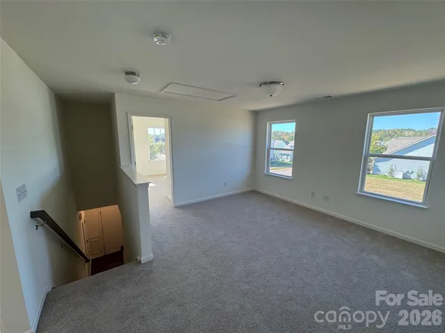 an empty room with windows