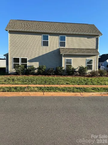 a front view of house with yard