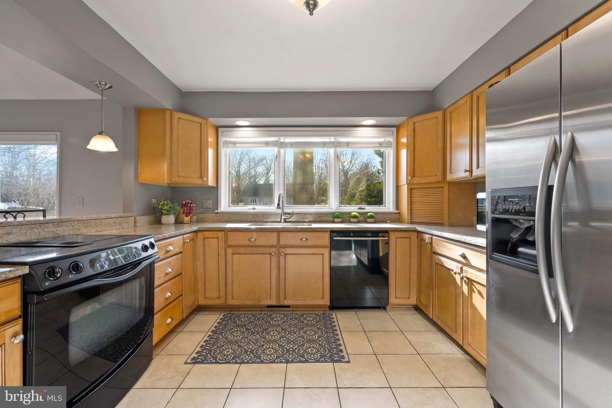 1403 Corey Lane Annapolis, MD 21401 - Photo 13 of 40 a kitchen with a stove a sink dishwasher a refrigerator and a oven