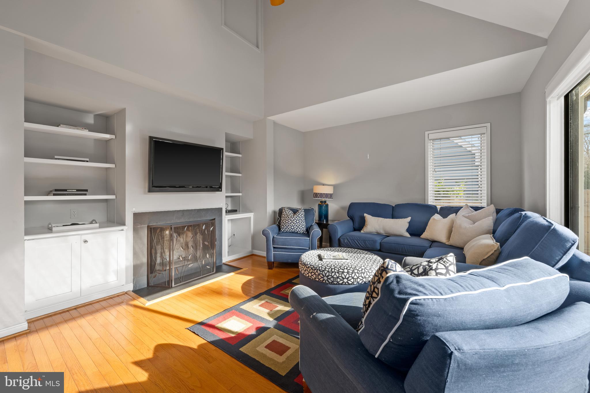 1403 Corey Lane Annapolis, MD 21401 - Photo 21 of 40 a living room with furniture and a flat screen tv
