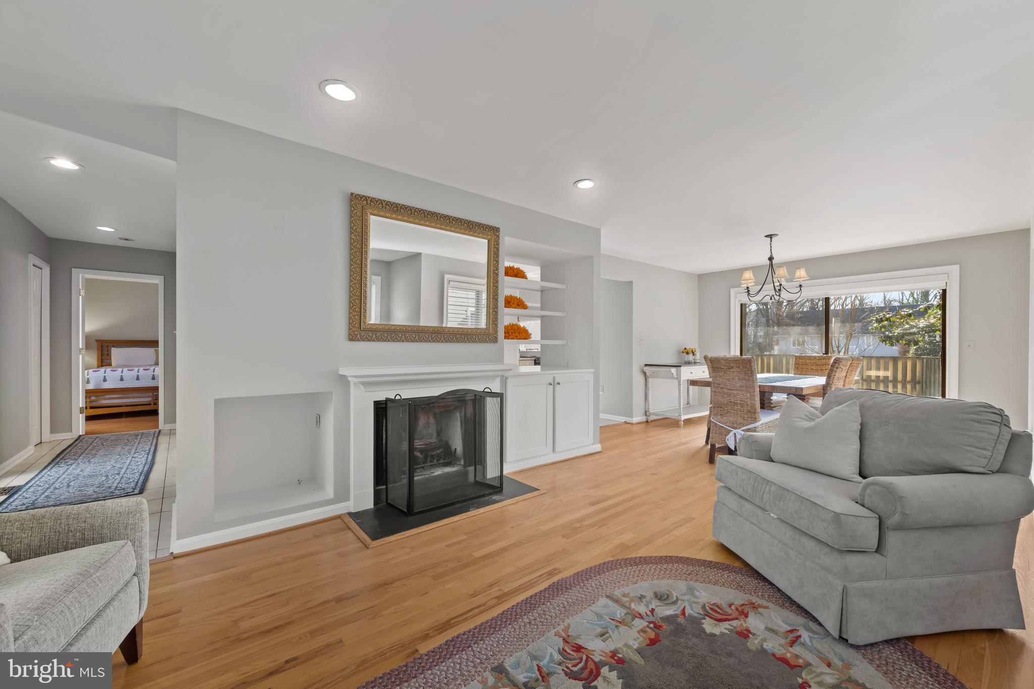 1403 Corey Lane Annapolis, MD 21401 - Photo 9 of 40 a living room with furniture and a fireplace