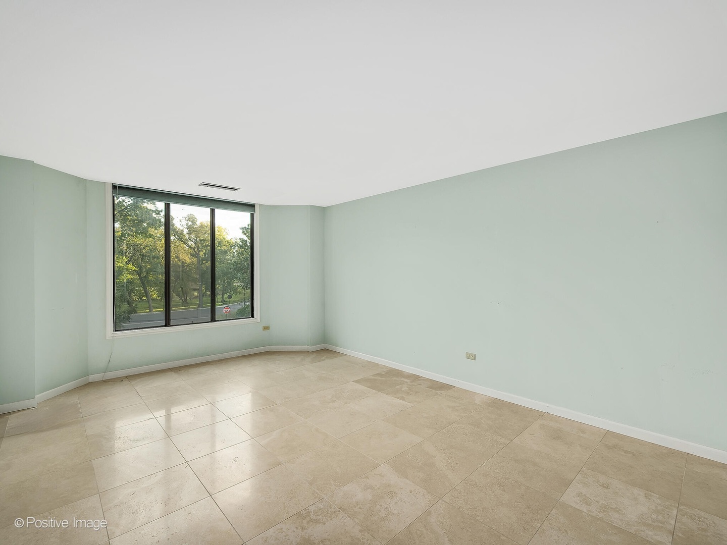 1401 Burr Oak Road, Unit 202B Hinsdale, IL 60521 - Photo 22 of 40 an empty room with a window