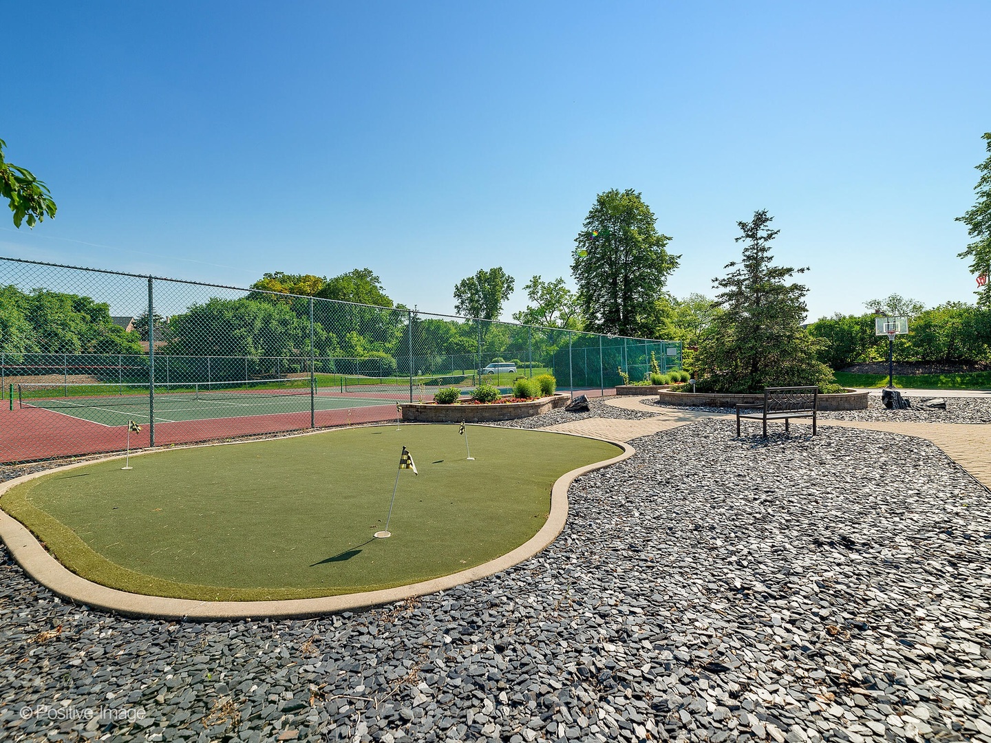 1401 Burr Oak Road, Unit 202B Hinsdale, IL 60521 - Photo 40 of 40 a view of a swimming pool with a yard