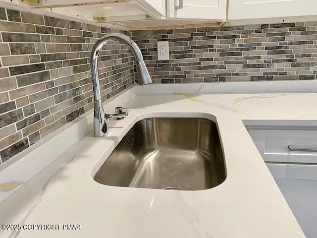 a close view of sink and mirror