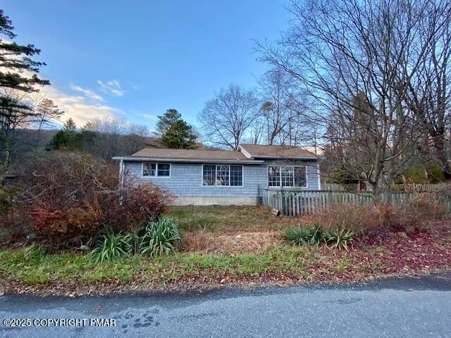 a view of house with outdoor space