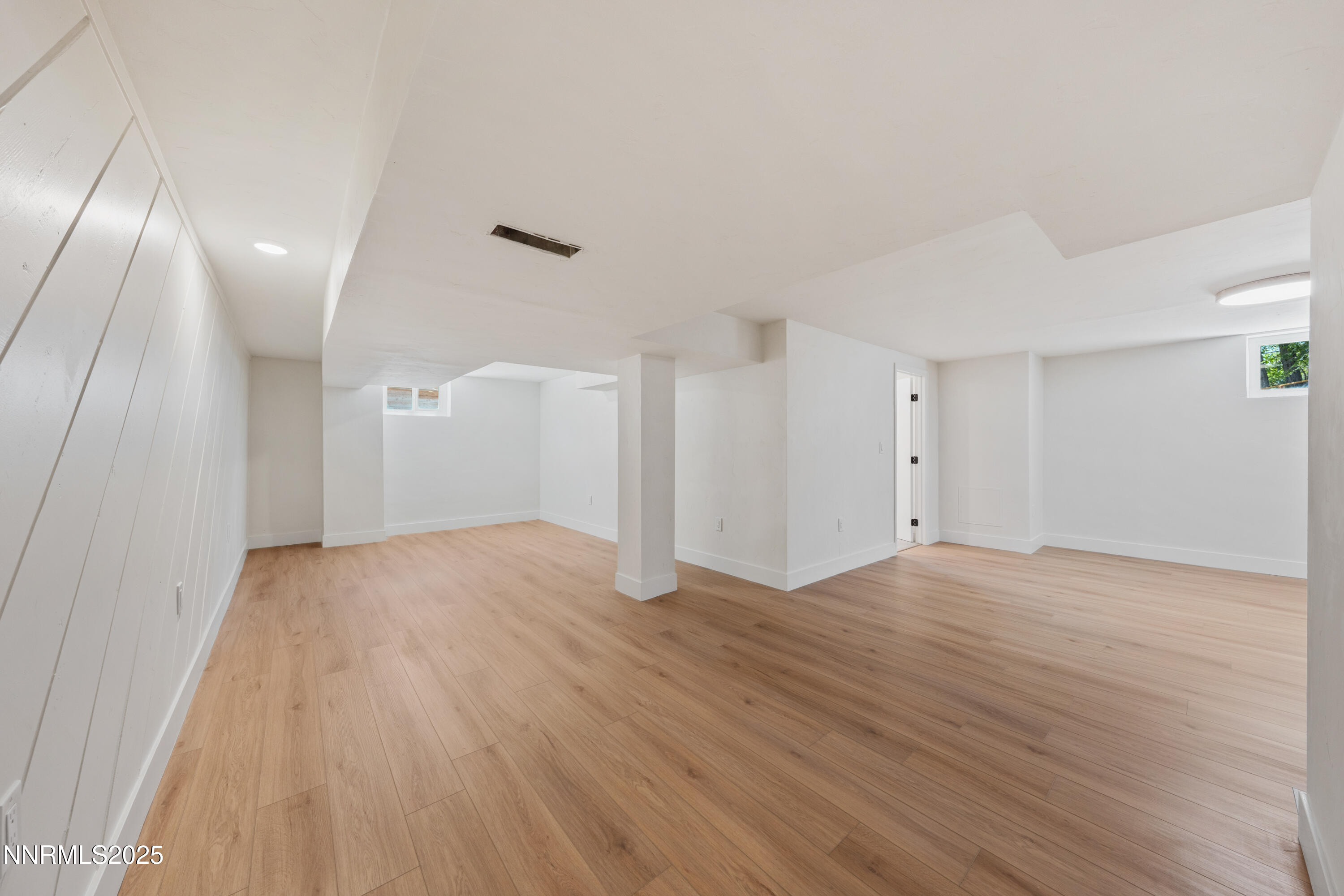 2303 Homestead Place Reno, NV 89509 - Photo 43 of 54 a view of empty room with wooden floor