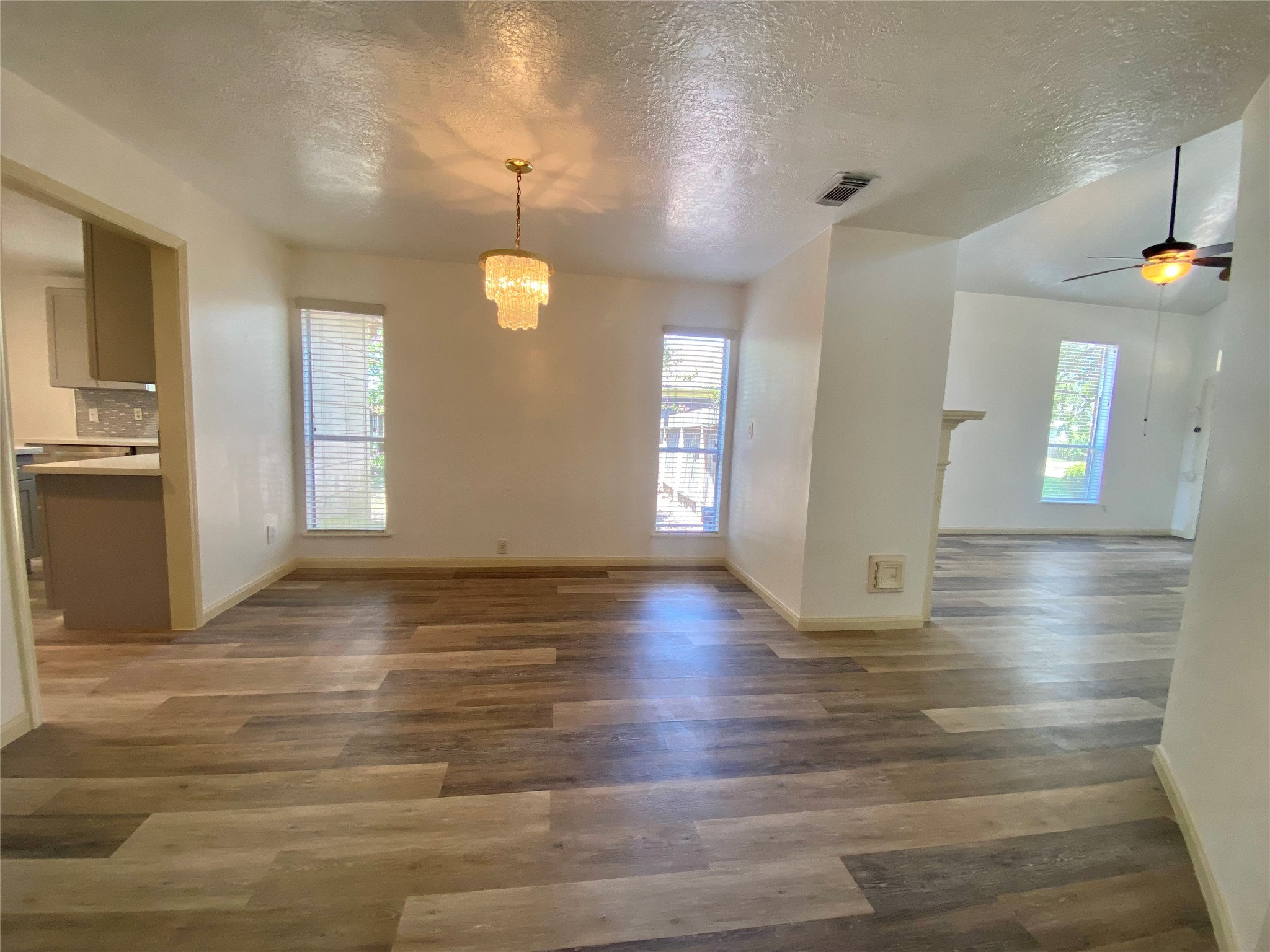 4203 Breckenridge Drive Houston, TX 77066 - Photo 25 of 43 an empty room with wooden floor and windows