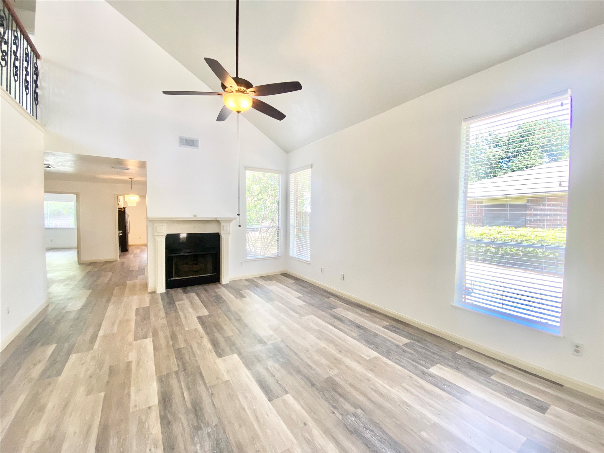 4203 Breckenridge Drive Houston, TX 77066 - Photo 31 of 43 a view of empty room with fireplace and fan