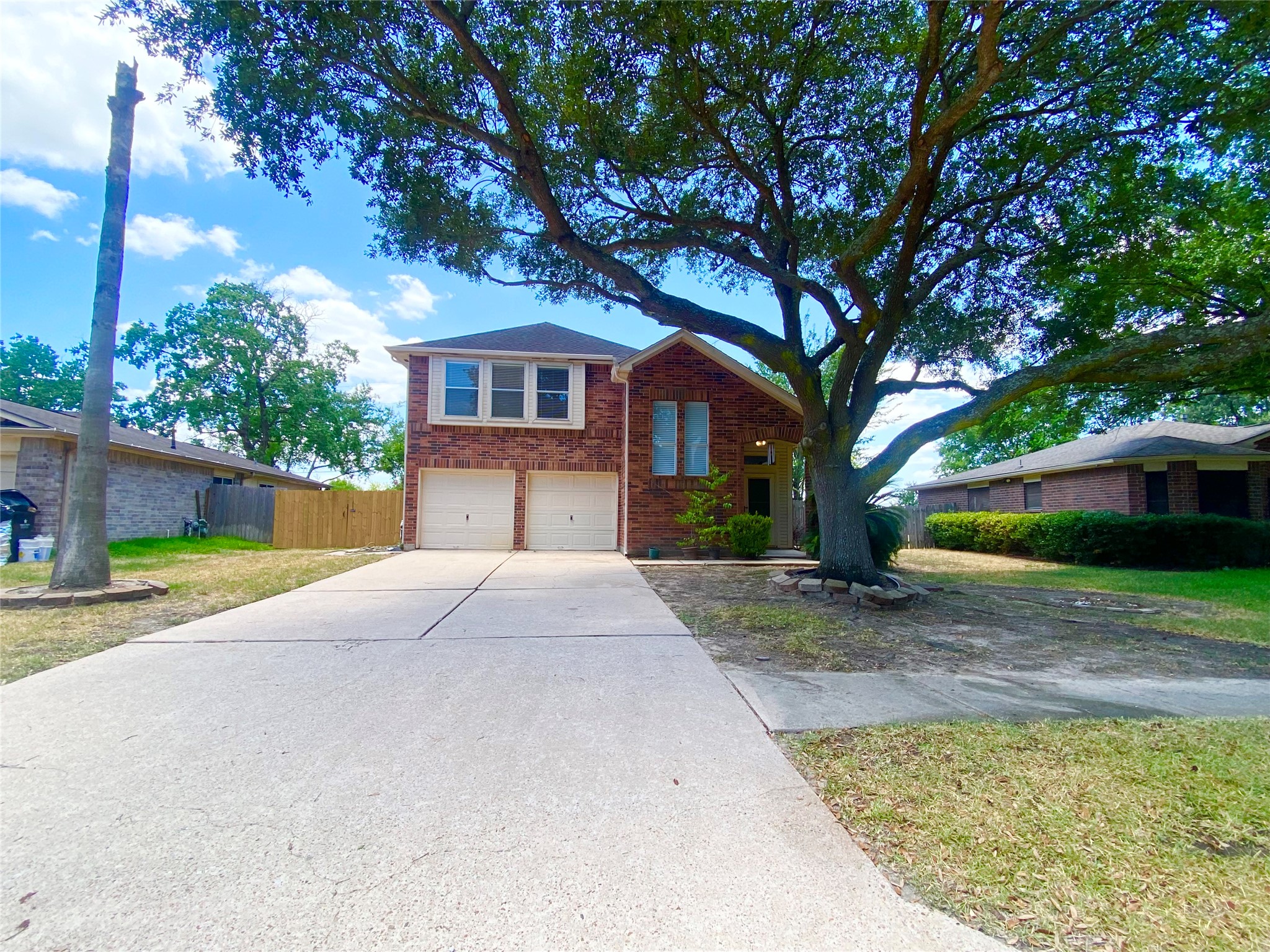 4203 Breckenridge Drive Houston, TX 77066 - Photo 43 of 43 a front view of a house with a yard and garage