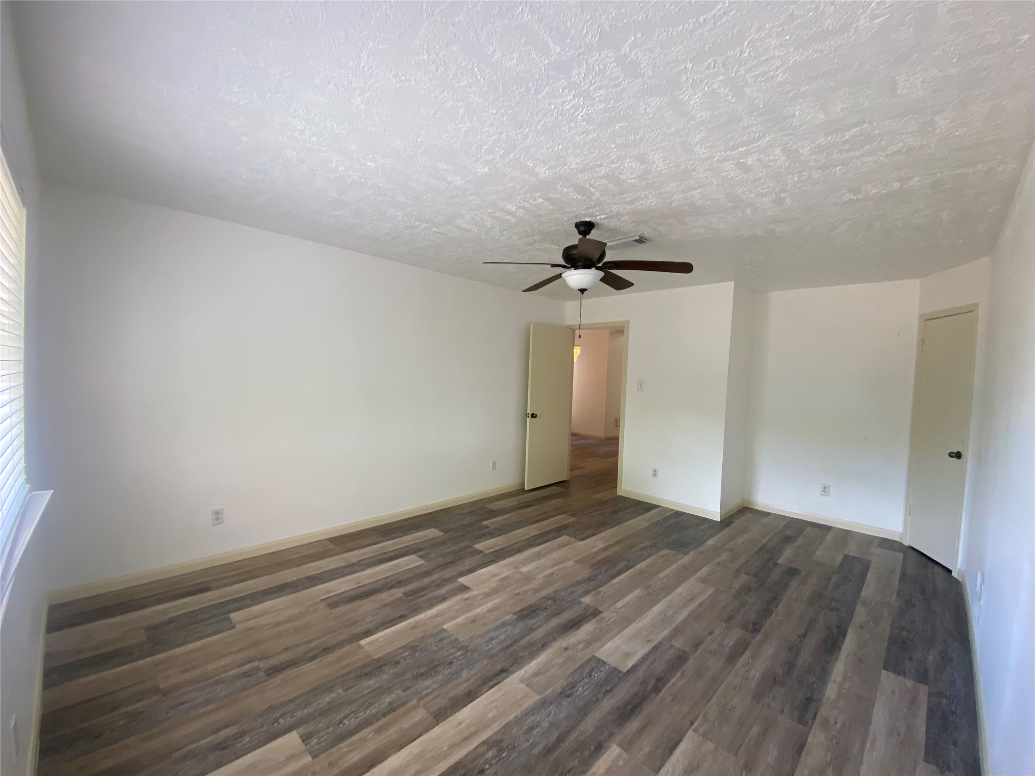 4203 Breckenridge Drive Houston, TX 77066 - Photo 10 of 43 wooden floor in an empty room