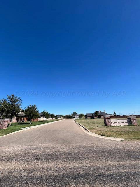 Tract 8 Orient Avenue Claude, TX 79019 - Photo 2 of 8 a view of a road with a ocean view
