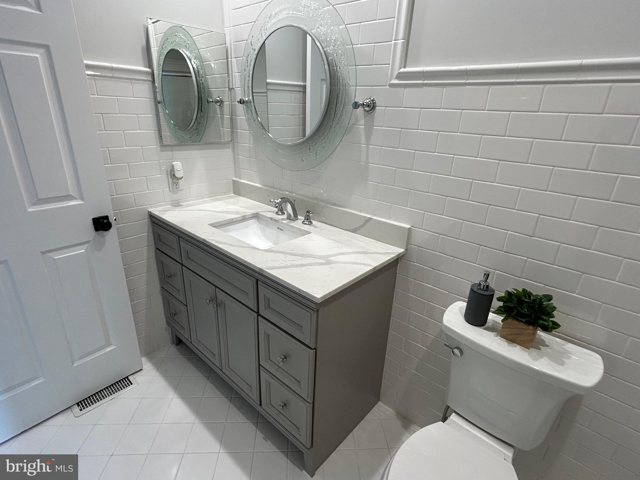 1 Pendleton Court Marlton, NJ 08053 - Photo 19 of 36 a bathroom with a toilet sink and mirror