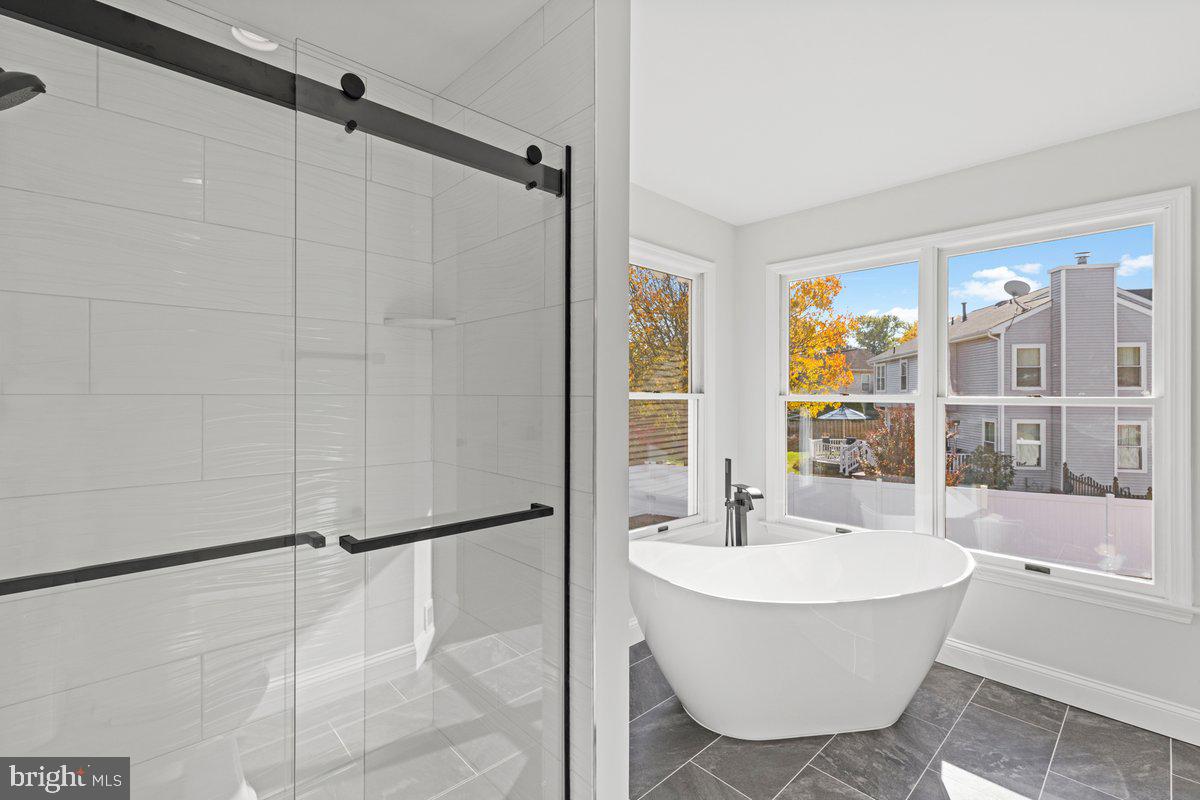 1 Pendleton Court Marlton, NJ 08053 - Photo 32 of 36 a bathroom with a bathtub and a shower