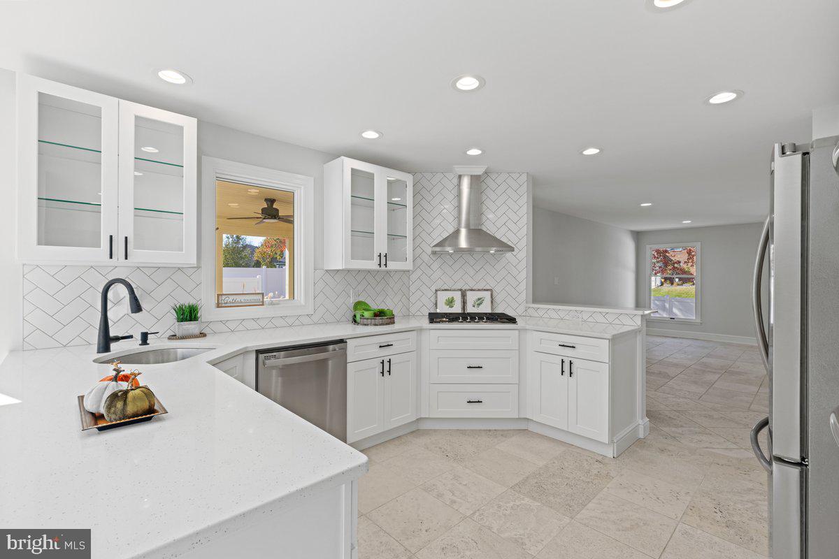 1 Pendleton Court Marlton, NJ 08053 - Photo 7 of 36 a kitchen with granite countertop a sink and white cabinets