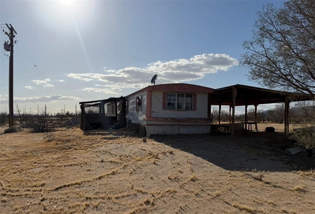 41854 Silver Valley Road Newberry Springs, CA 92365 - Photo 1 of 18 a view of a house with a yard