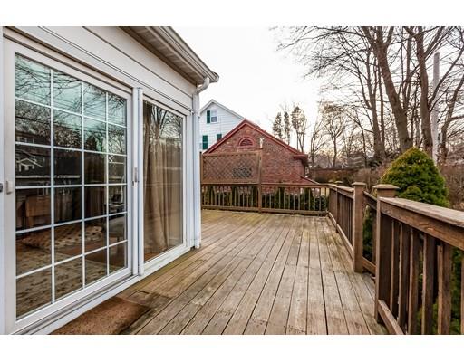 37 Arapahoe Road Newton, MA 02465 - Photo 29 of 30 a view of house with wooden floor and floor to ceiling window