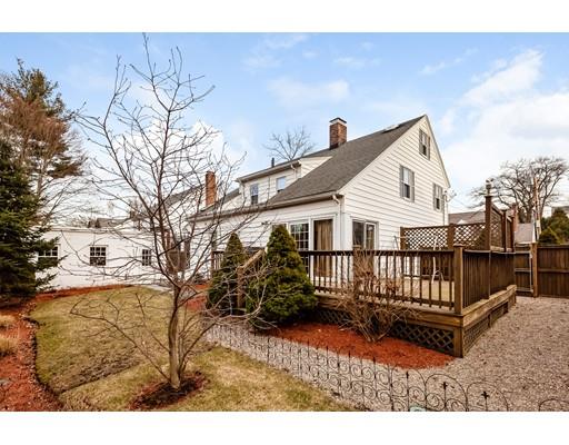 37 Arapahoe Road Newton, MA 02465 - Photo 30 of 30 a white house that has a tree in front of it