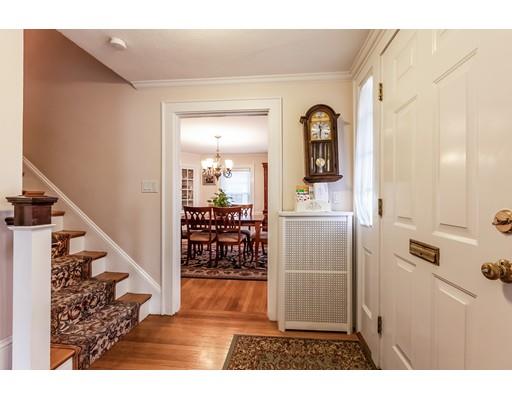 37 Arapahoe Road Newton, MA 02465 - Photo 4 of 30 a view of a hallway with wooden floor windows and entryway