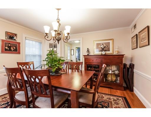 37 Arapahoe Road Newton, MA 02465 - Photo 8 of 30 a view of a dining room and chandelier