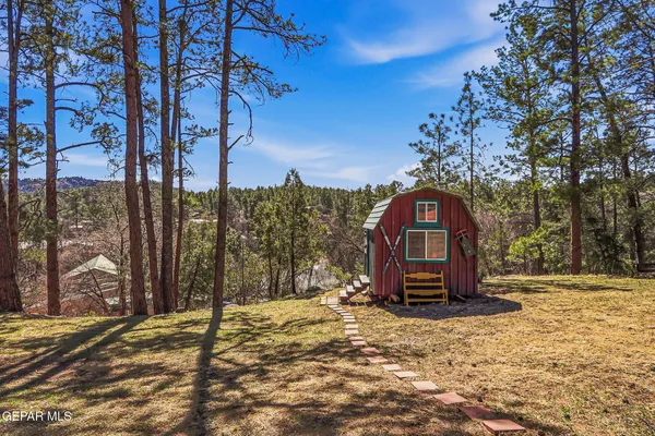 a view of a house with a snow on the yard