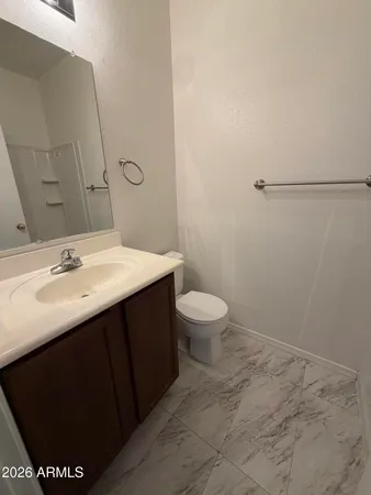 a bathroom with a sink and a toilet