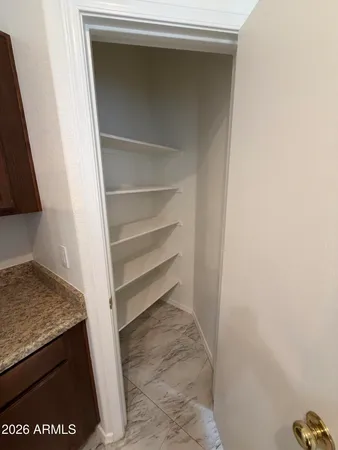 a view of storage and utility room