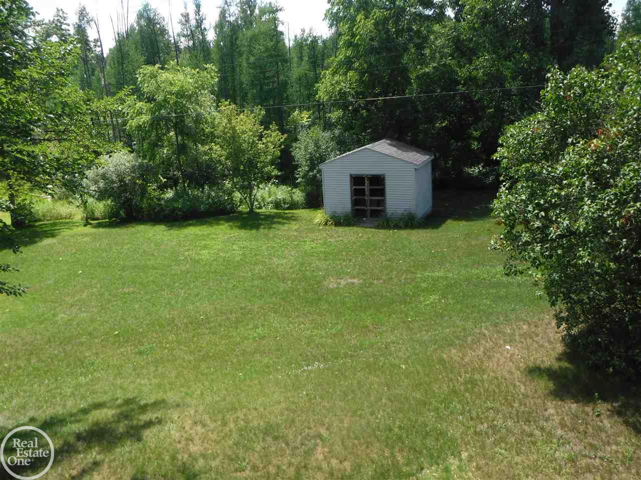 4585 Rattek Road Clarkston, MI 48346 - Photo 32 of 41 Storage shed