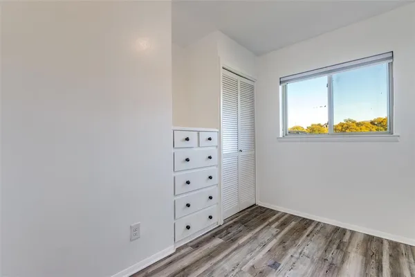 an empty room with window