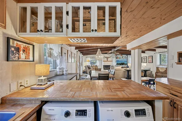 a bedroom with a large bed and a tv