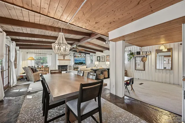 a kitchen with kitchen island a stove and a wooden floor