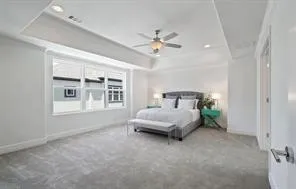 a bedroom with furniture and window