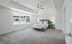 a bathroom with a tub a sink and a mirror