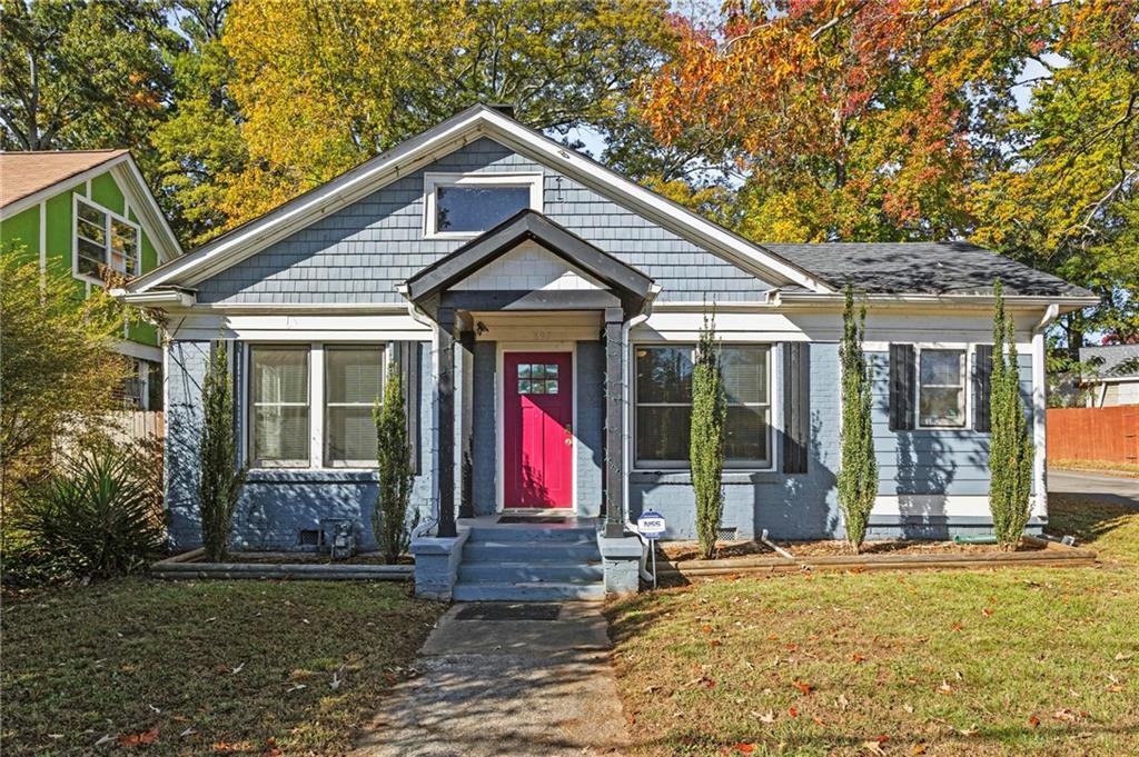 a front view of a house with a porch