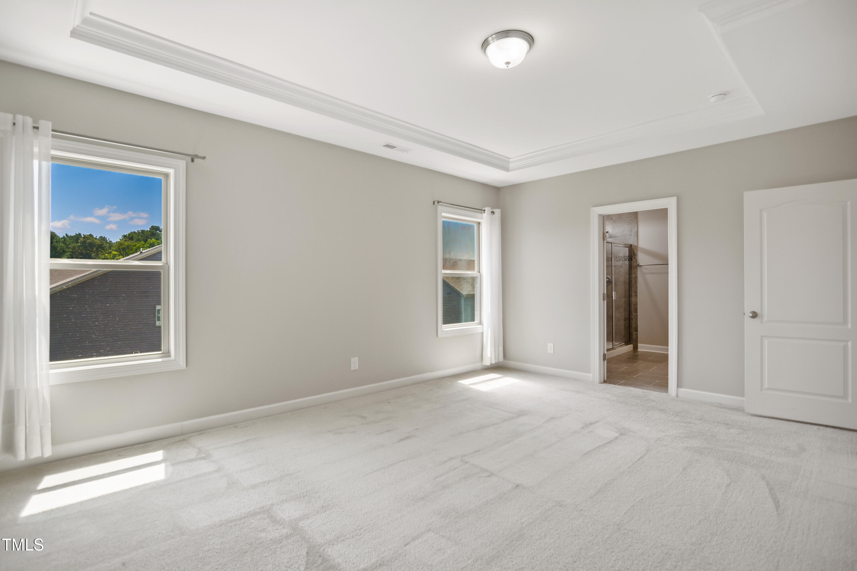 917 Lippincott Road Durham, NC 27703 - Photo 18 of 30 a view of an empty room with window and closet area