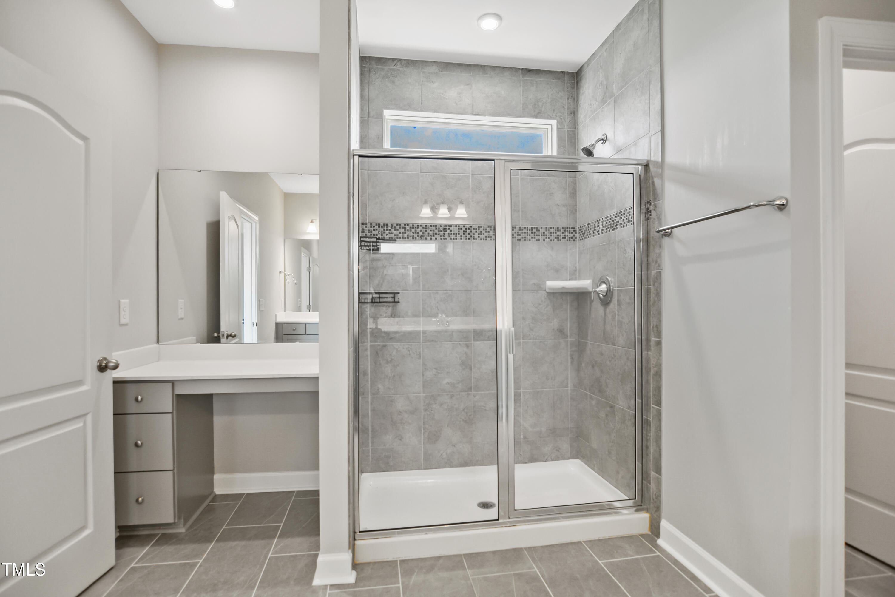 917 Lippincott Road Durham, NC 27703 - Photo 20 of 30 a bathroom with a shower and a sink