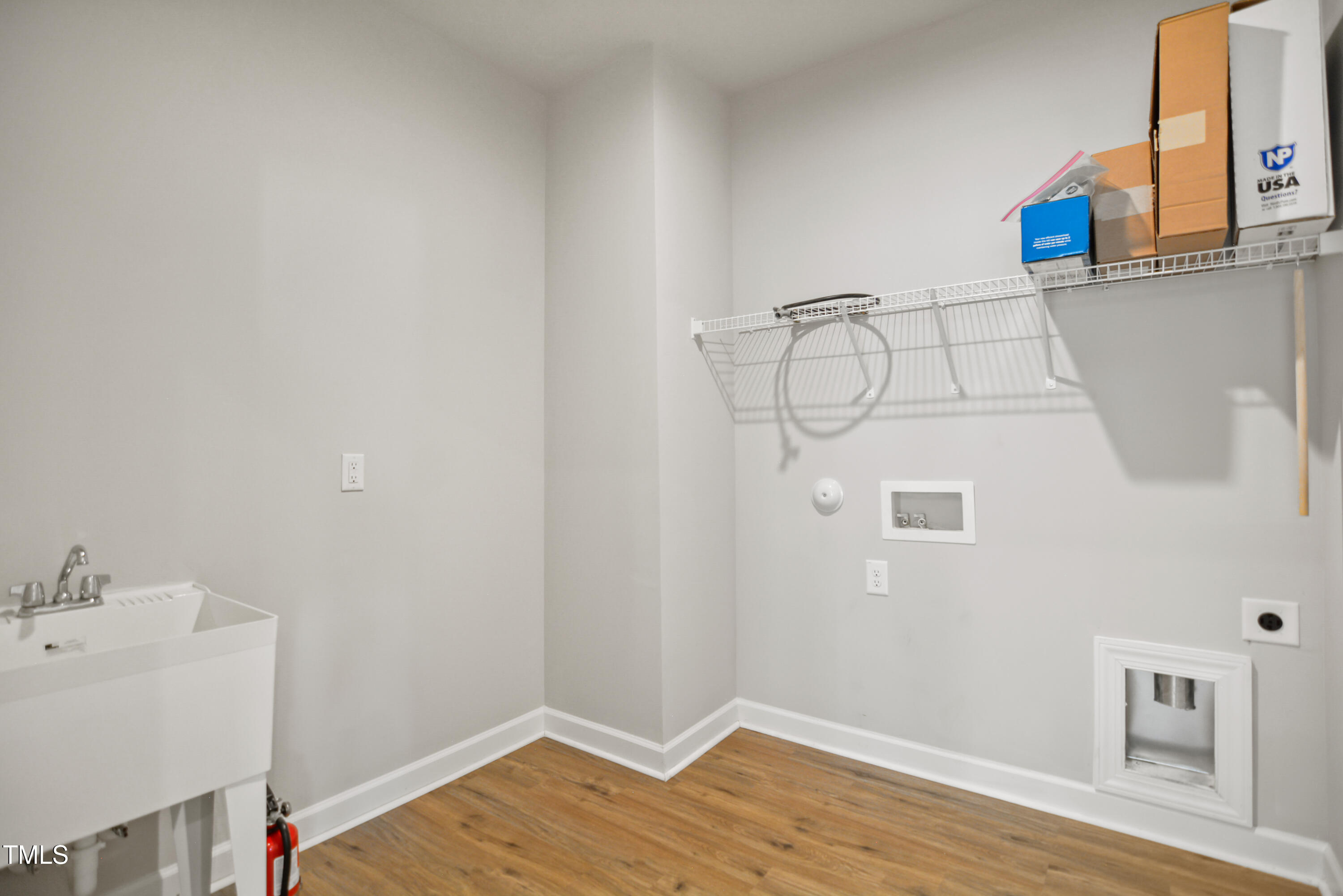 917 Lippincott Road Durham, NC 27703 - Photo 28 of 30 a view of a room with wooden floor and bathroom