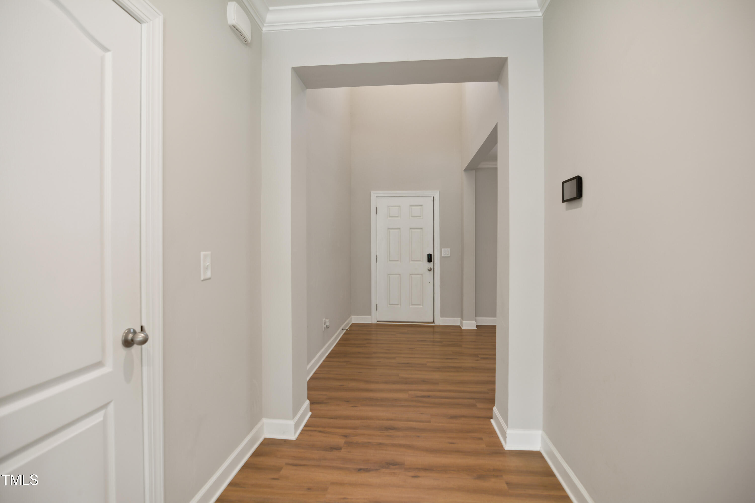 917 Lippincott Road Durham, NC 27703 - Photo 3 of 30 a view of a hallway with wooden floor