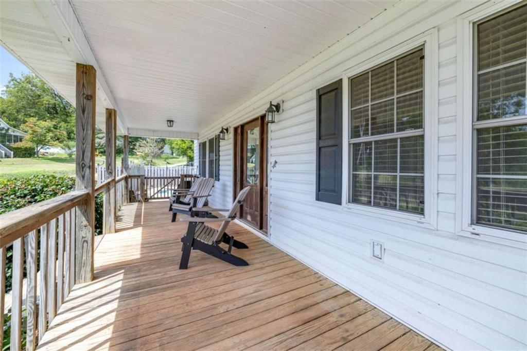 131 Caudell Drive Lula, GA 30554 - Photo 11 of 58 a view of a living room and wooden deck