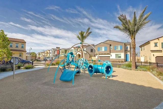 a front view of a house with outdoor seating