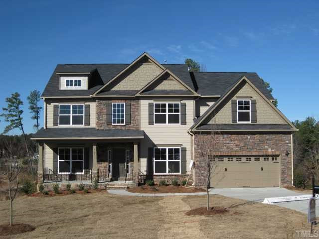 2101 Lower Lake Road Wake Forest, NC 27587 - Photo 1 of 12 Fantastic exterior of stacked stone, shake & siding with front porch! Huge front yard! Exterior Front