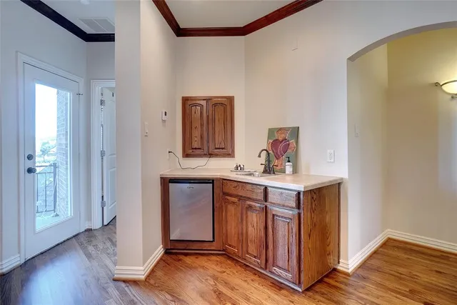 a view of kitchen with wooden floor